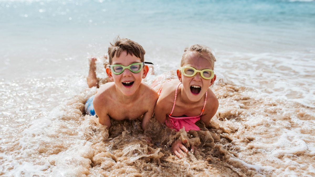 This image has an empty alt attribute; its file name is kids-in-the-sea-1200x675.jpg
