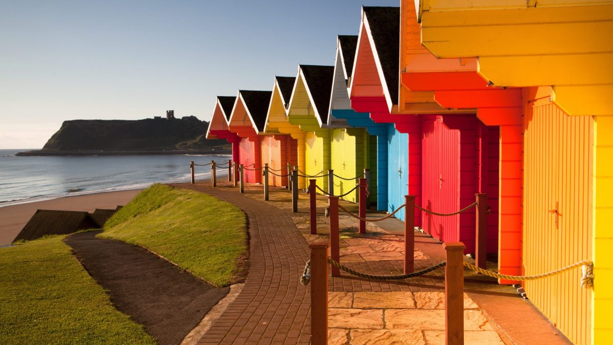 This image has an empty alt attribute; its file name is scarborough-beach-huts-1200x675.jpg
